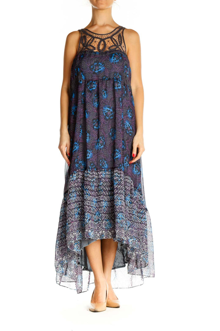 Front view of Free People blue floral maxi dress with crochet neckline