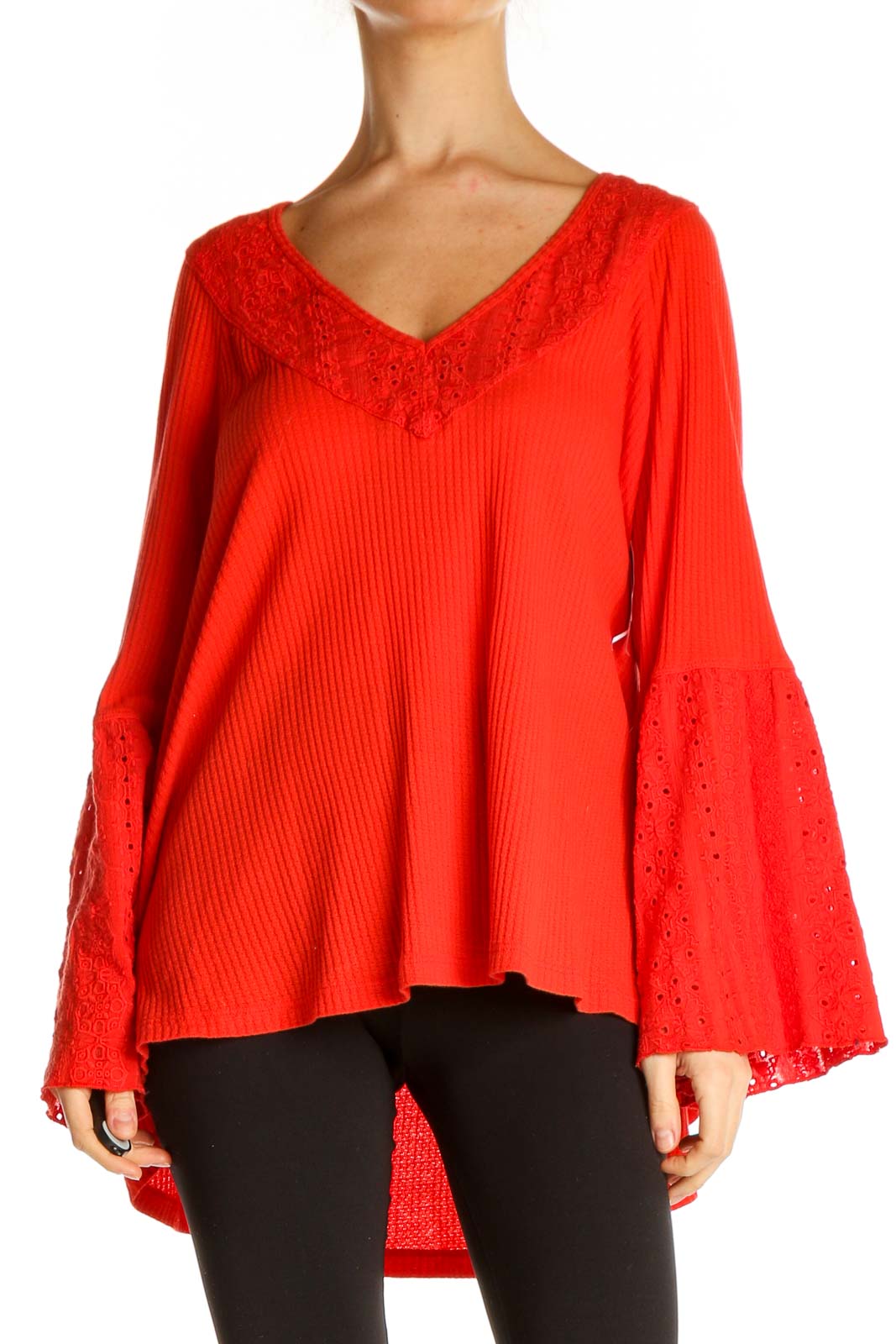 Front view of red Free People tunic top with lace-trimmed bell sleeves and V-neckline