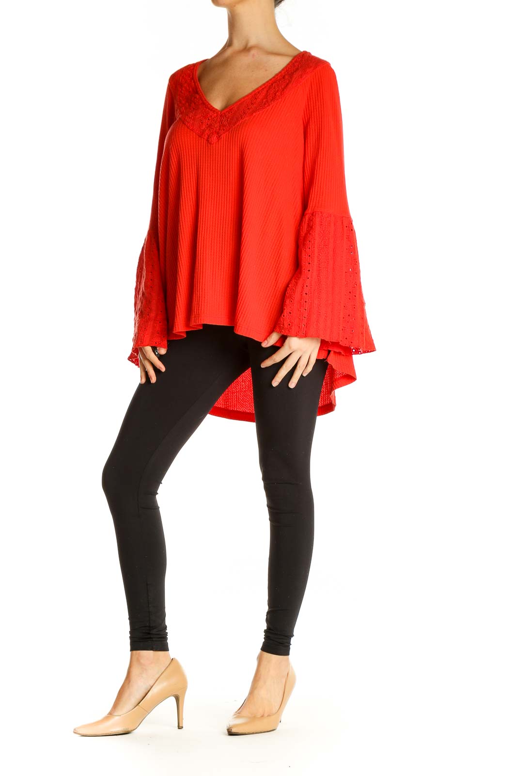 Front view of red Free People tunic top with lace-trimmed bell sleeves and V-neckline