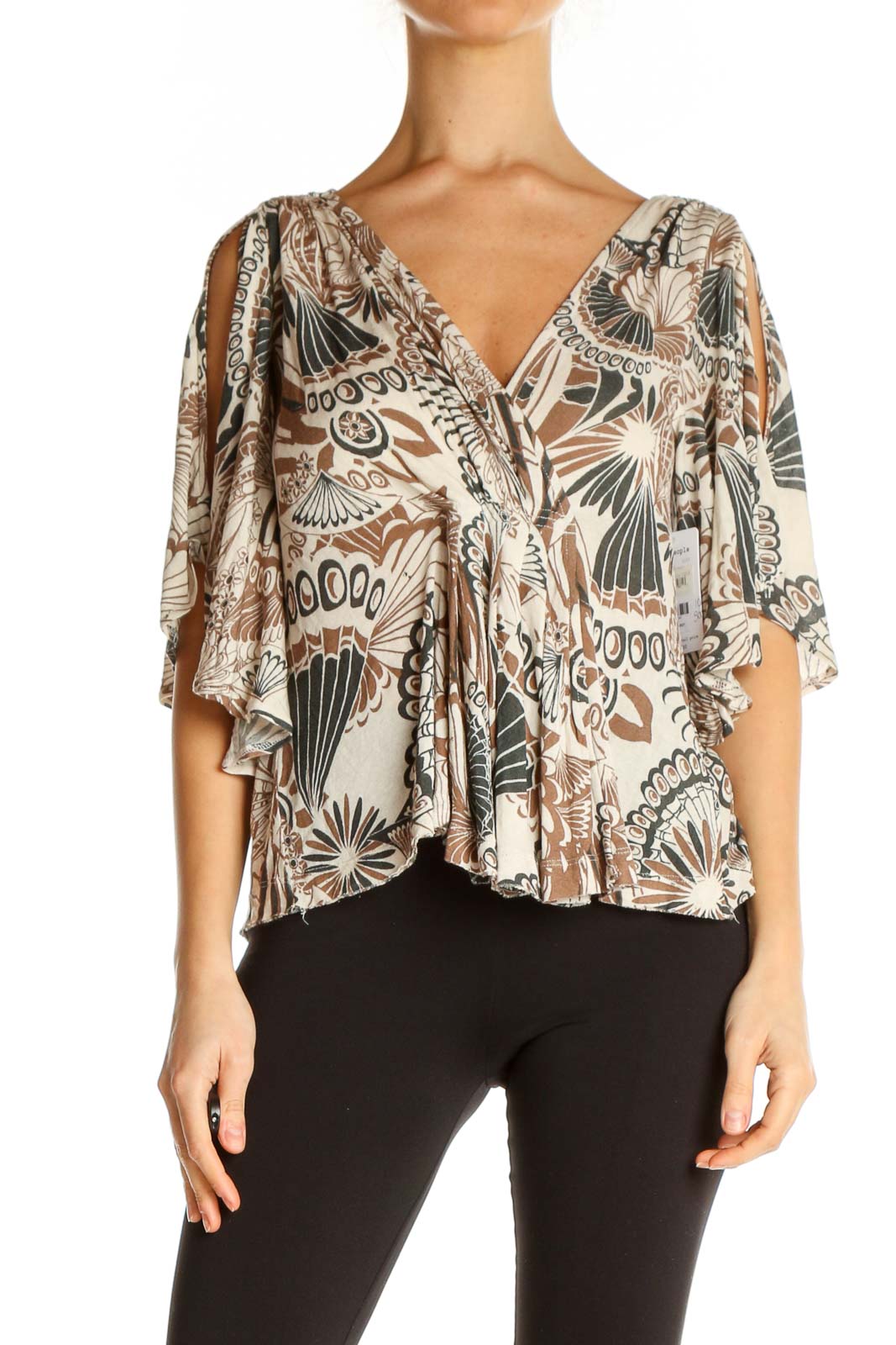 Front view of Free People beige floral print top with flutter sleeves