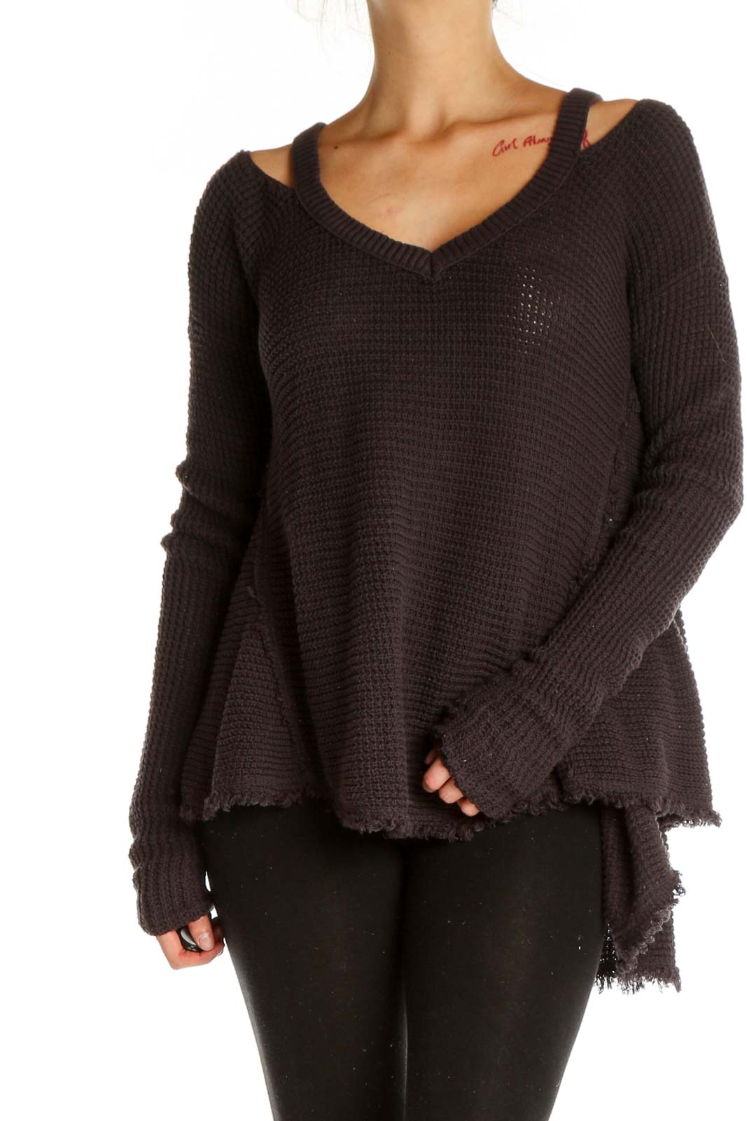 Front view of brown oversized knit sweater with cold-shoulder cutouts