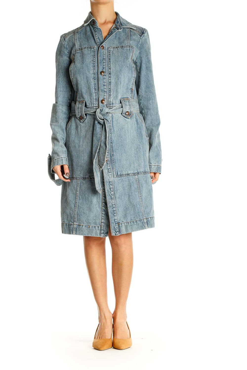 Front view of Free People light blue denim trench coat with belted waist