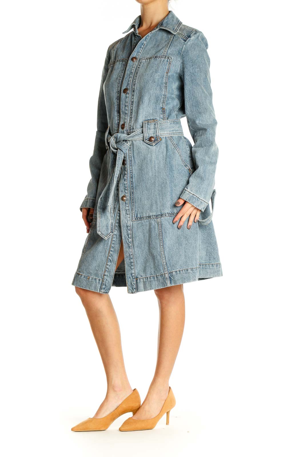 Front view of Free People light blue denim trench coat with belted waist