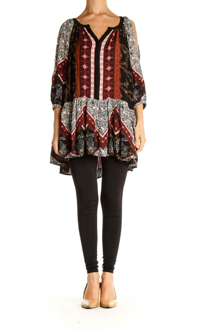 Front view of multicolor Free People boho patchwork tunic top