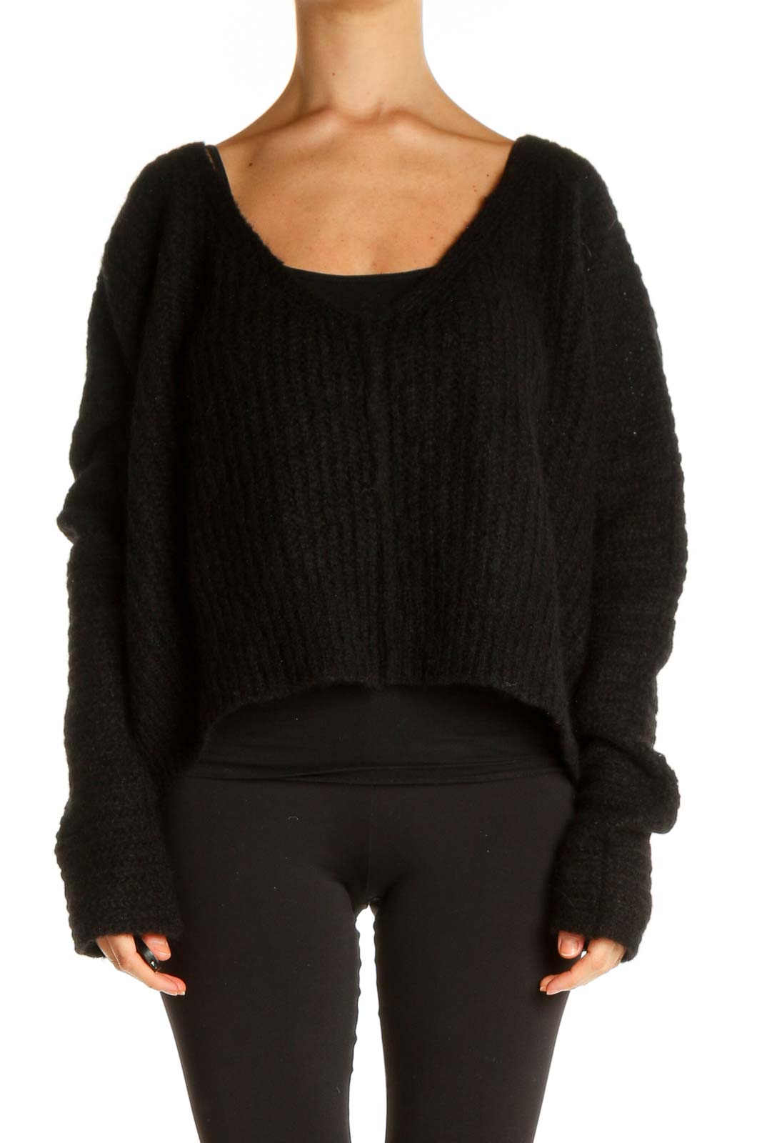 Front view of black cropped knit sweater from Free People