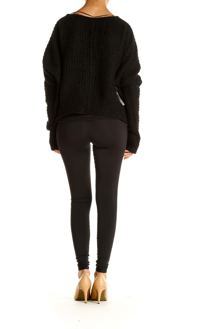 Back view of black cropped knit sweater from Free People