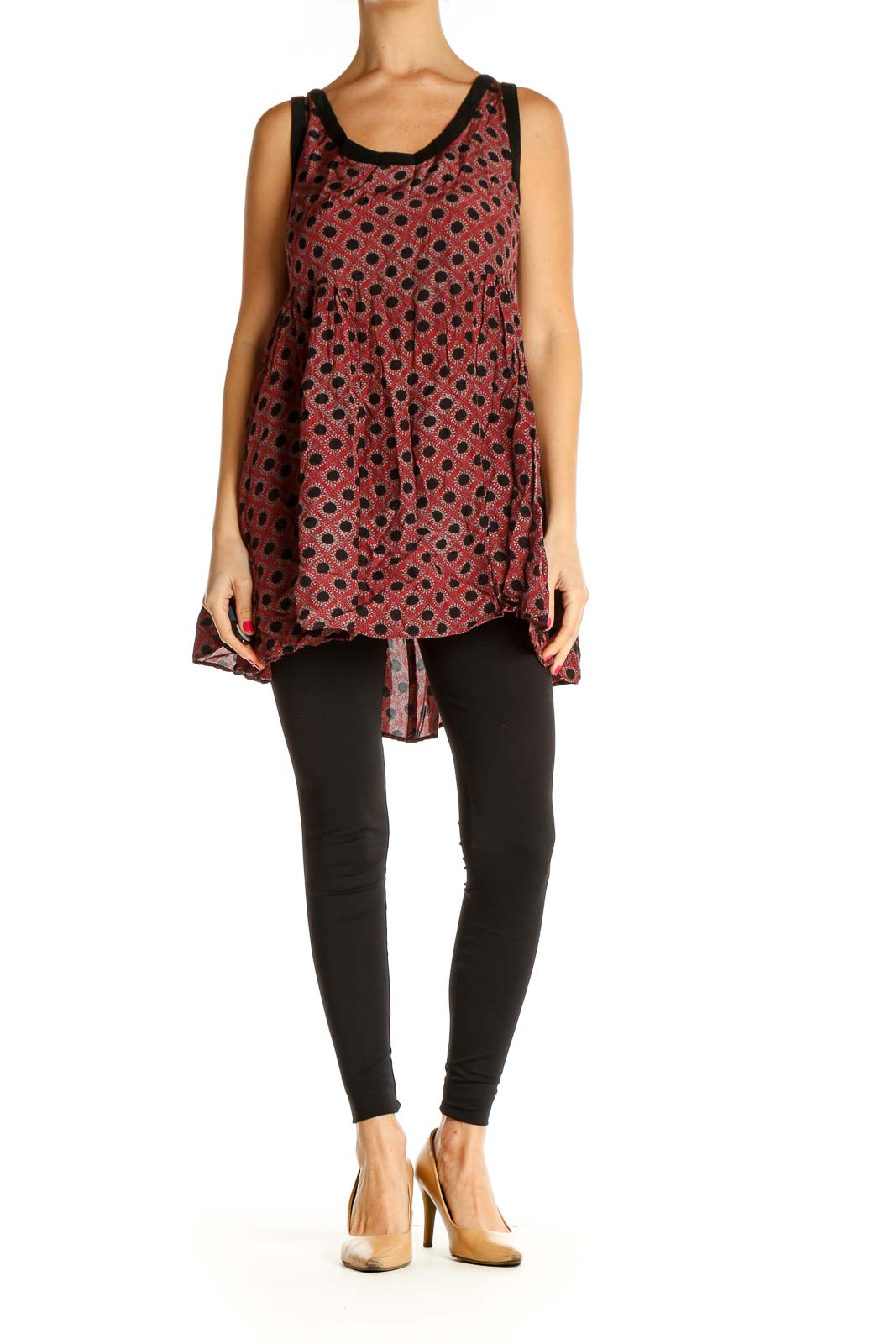 Front view of Free People red polka dot flowy tank top with black trim