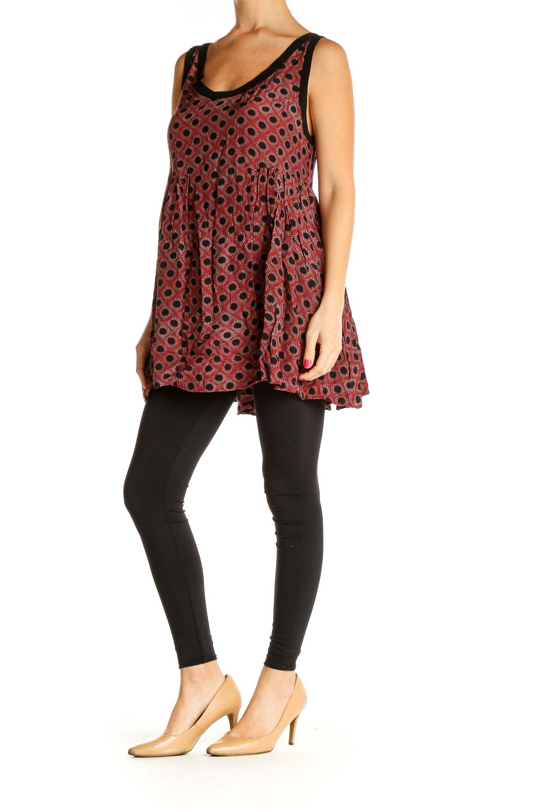 Front view of Free People red polka dot flowy tank top with black trim