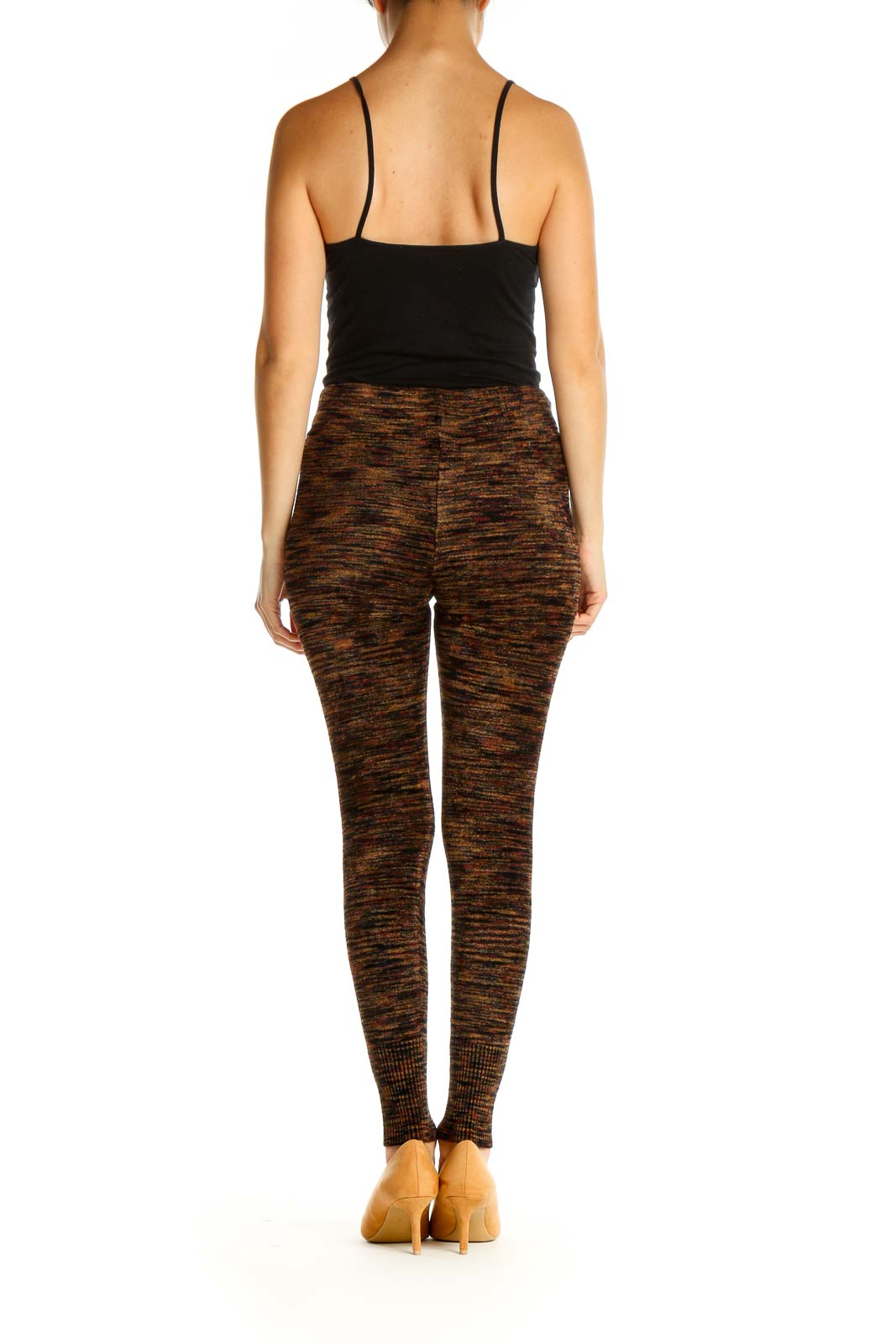 Back view of Free People brown marled knit leggings on model