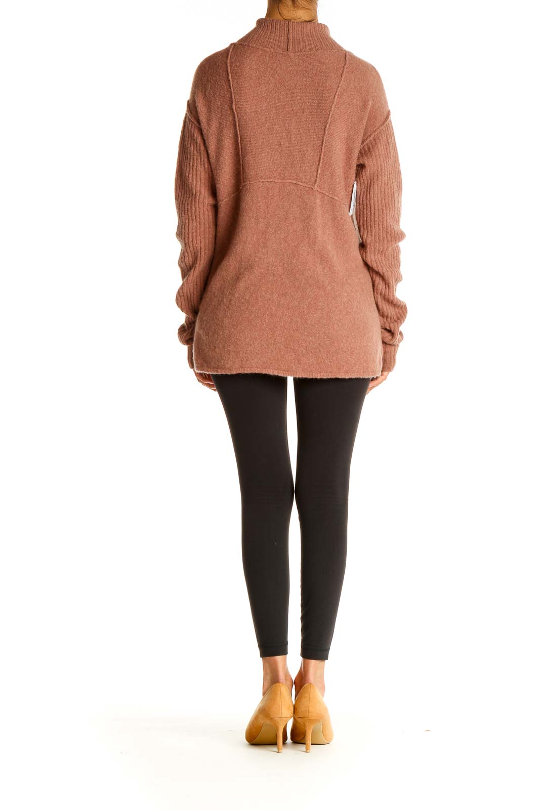 Back view of Free People terracotta ribbed mock neck sweater showing relaxed fit