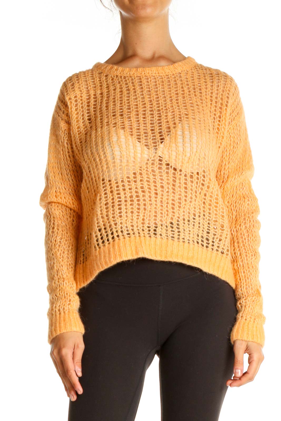 Front view of orange oversized open knit sweater from Free People