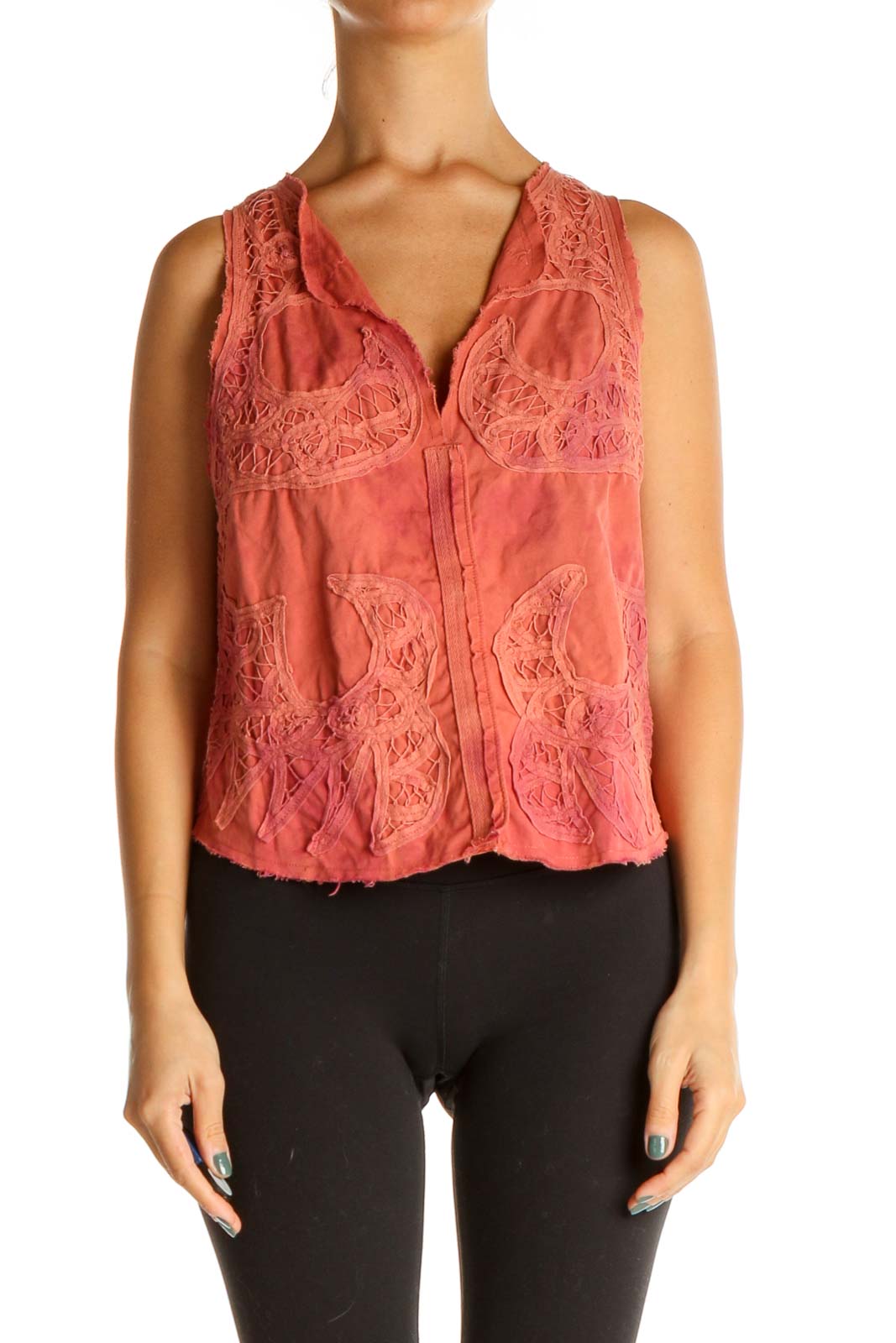 Front view of coral lace sleeveless vest from Free People