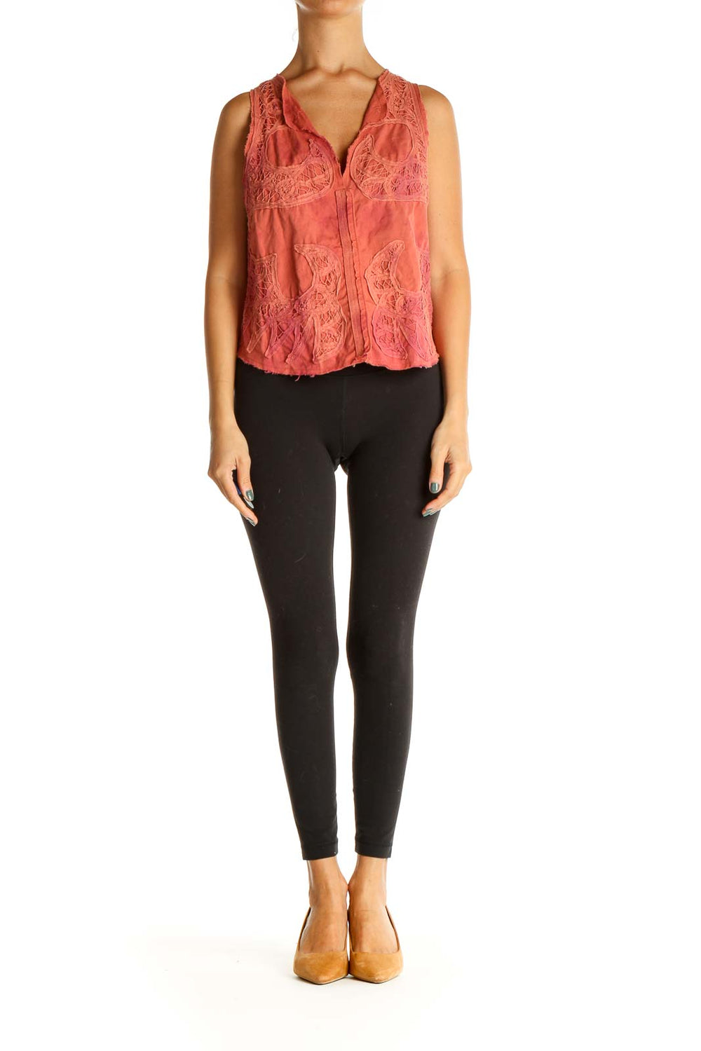 Front view of coral lace sleeveless vest from Free People