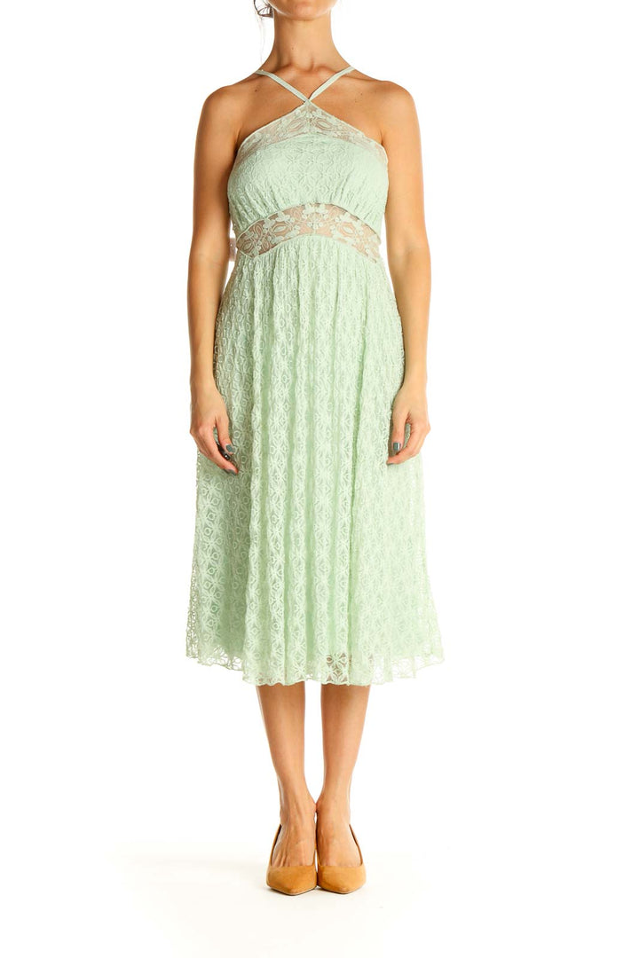 Front view of mint green lace halter midi dress by Free People