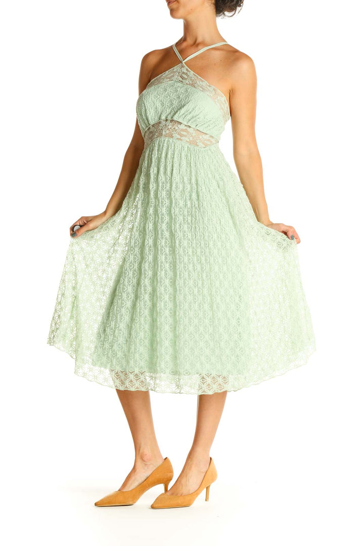 Front view of mint green lace halter midi dress by Free People