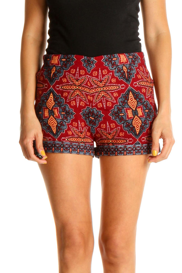 Front view of red patterned high-waisted boho shorts from Free People