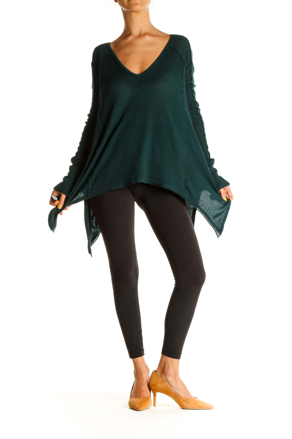 Front view of forest green Free People oversized V-neck sweater with asymmetrical hem