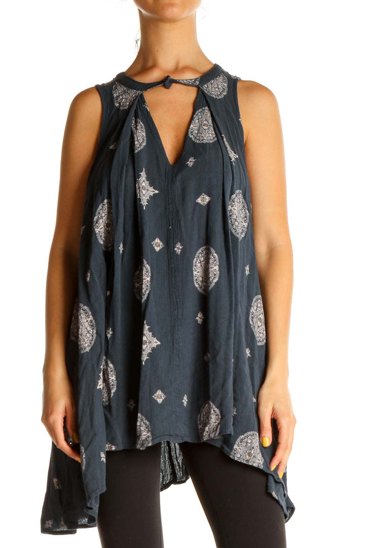 Front view of Free People navy tunic with white medallion print and keyhole neckline