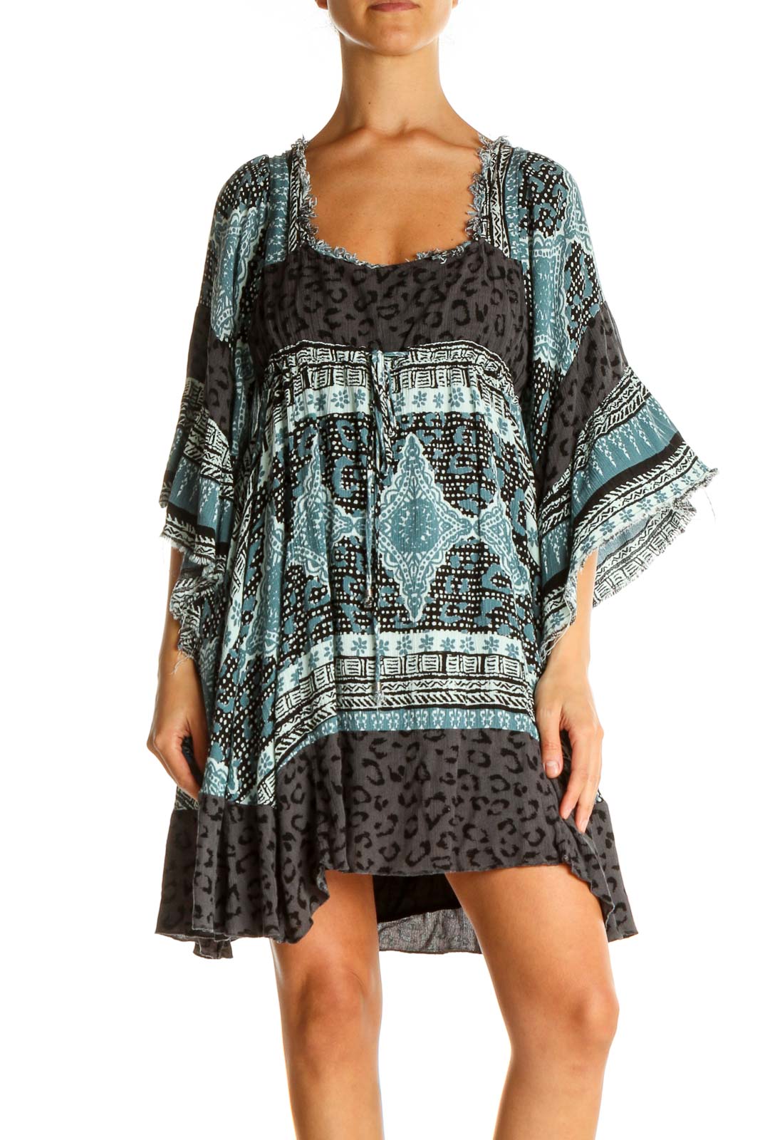 Front view of Free People blue and black patterned boho mini dress with bell sleeves