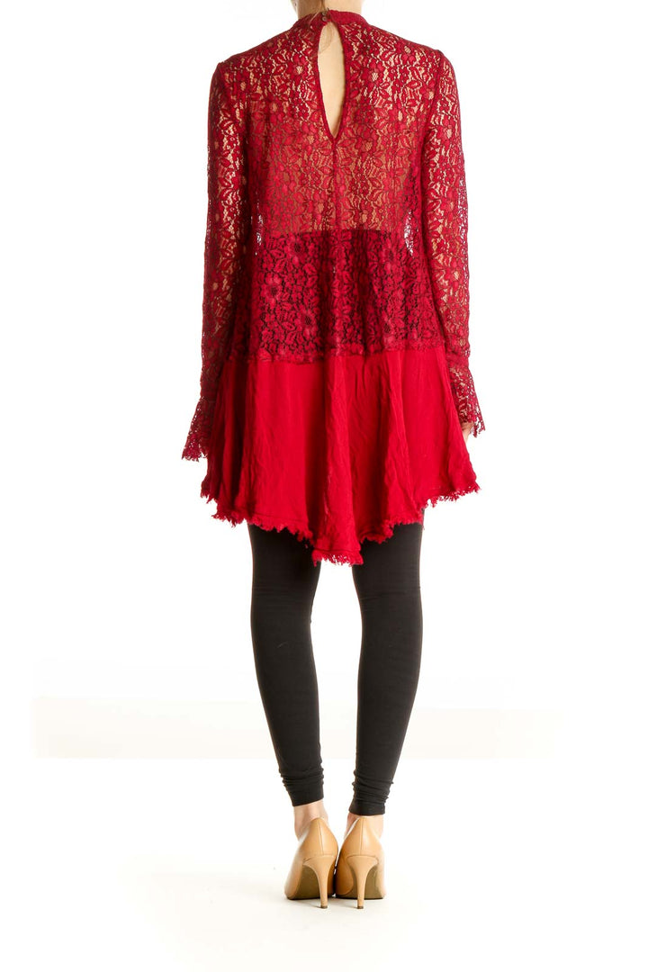 Back view of red lace bell sleeve tunic top from Free People