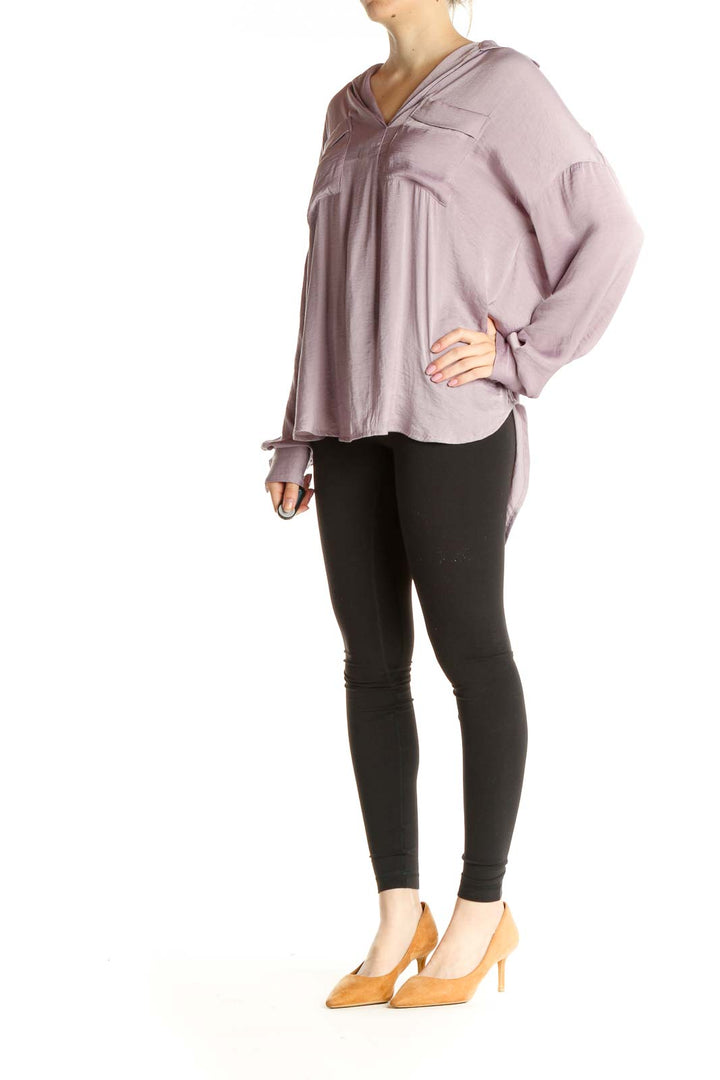 Front view of lavender Free People flowy V-neck blouse