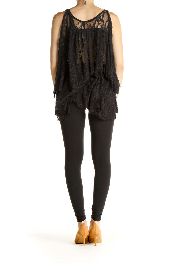 Back view of Free People black lace sheer flowy tank top