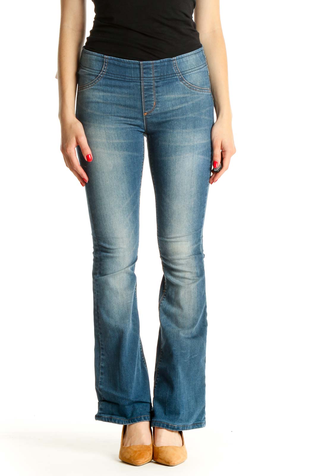 Front view of Free People blue flared denim jeans on model