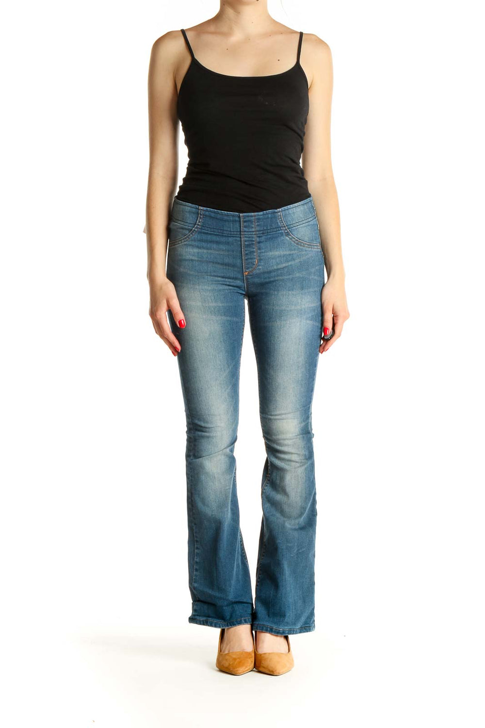 Front view of Free People blue flared denim jeans on model