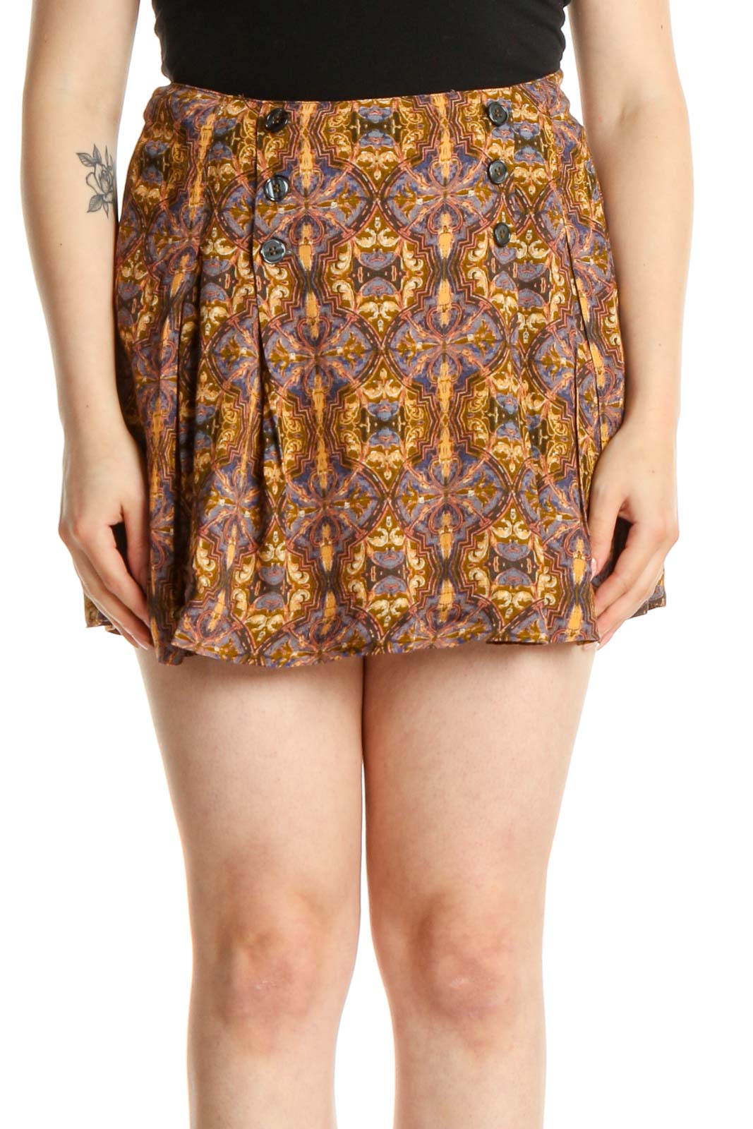 Front view of Free People brown floral print pleated shorts