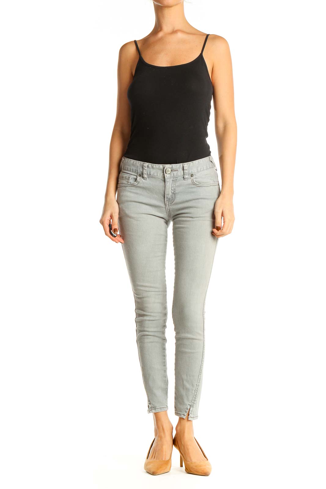 Front view of Free People light gray skinny ankle jeans on model