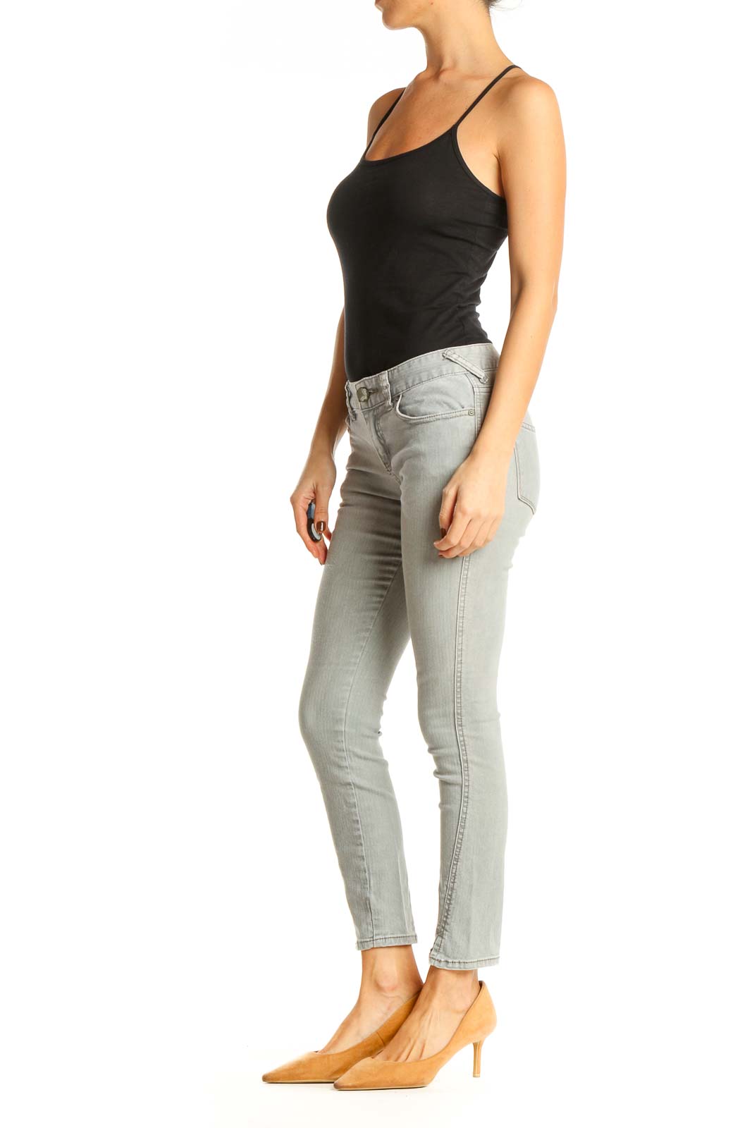 Front view of Free People light gray skinny ankle jeans on model