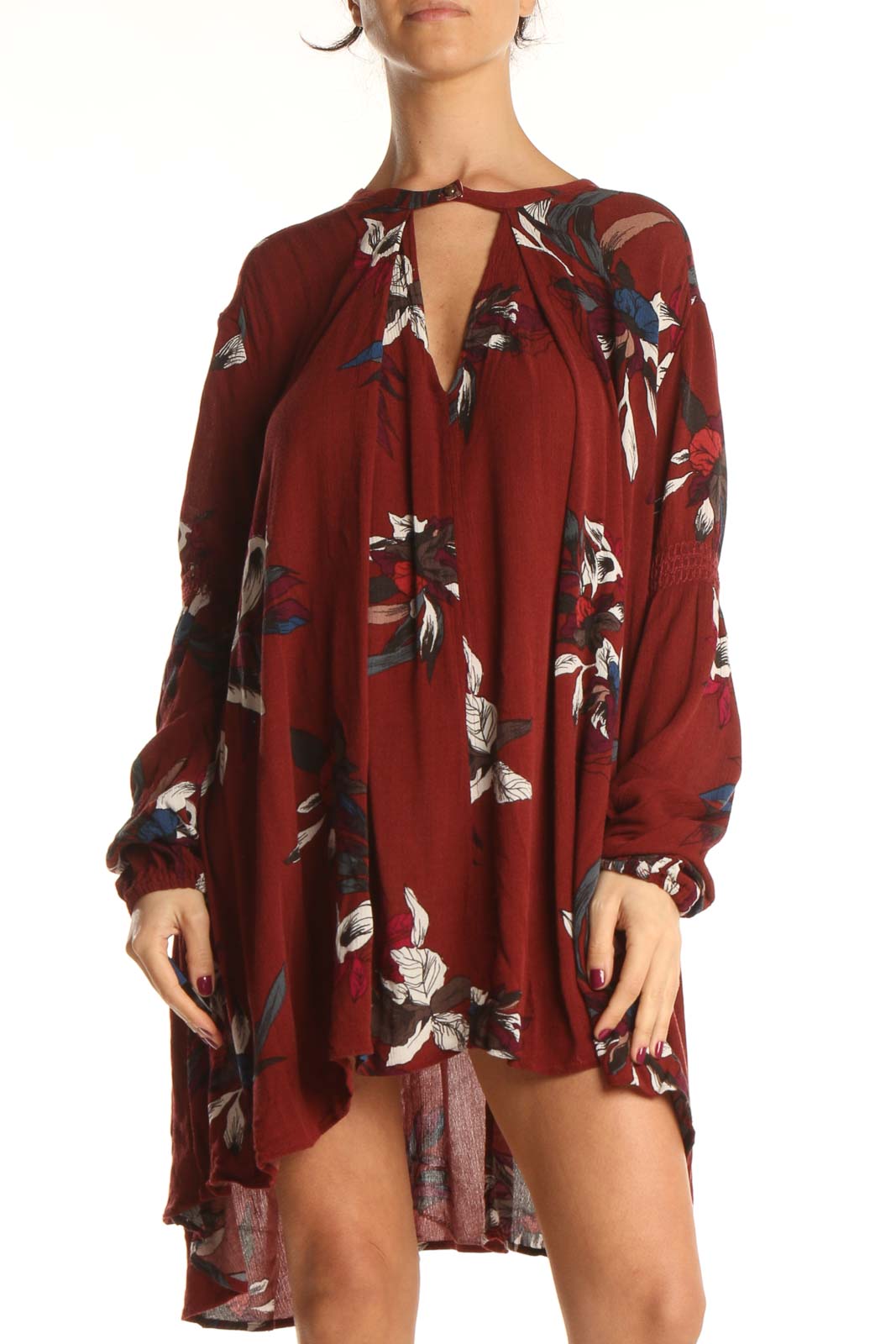 Front view of burgundy floral Free People dress with V-neckline and long sleeves