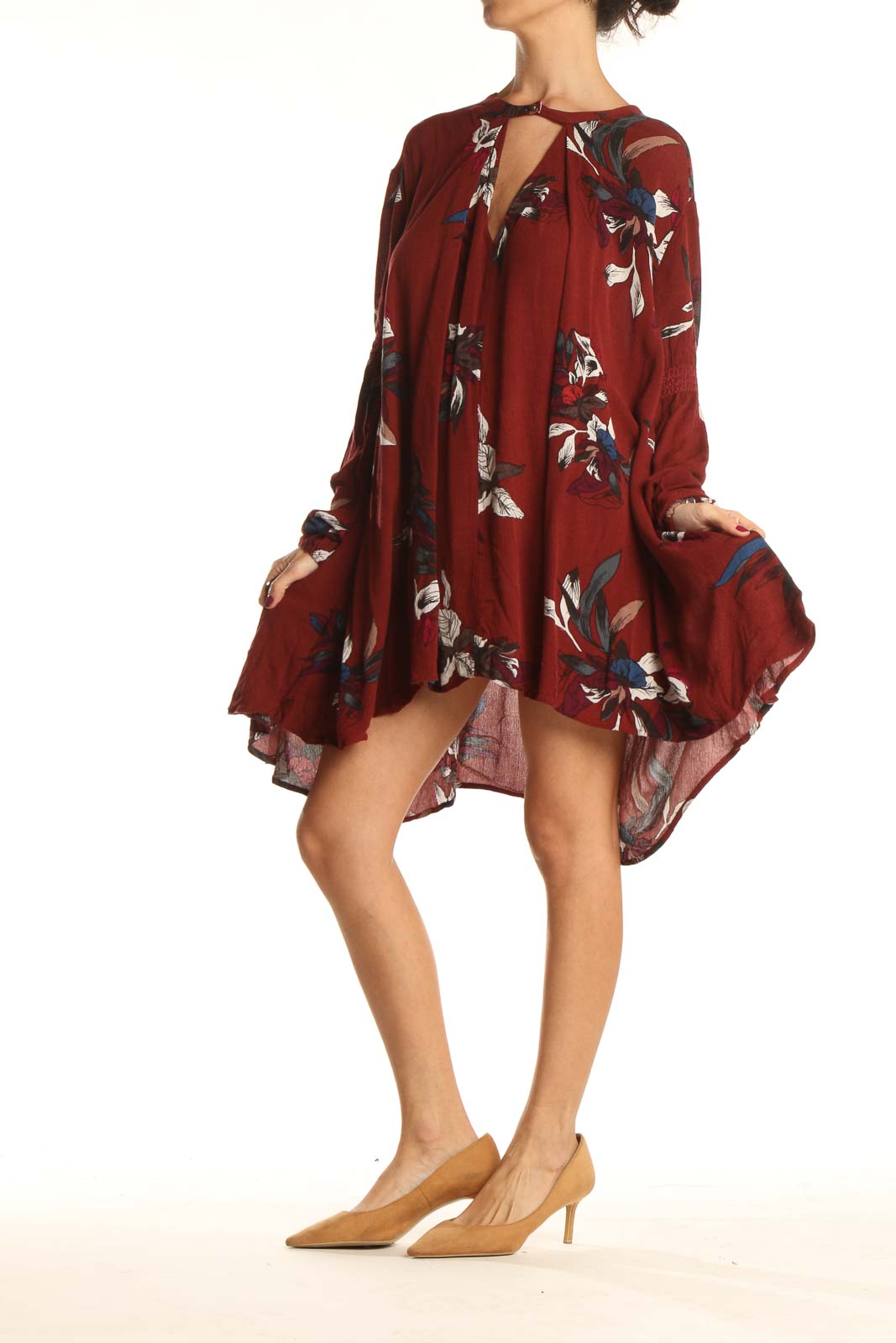 Front view of burgundy floral Free People dress with V-neckline and long sleeves