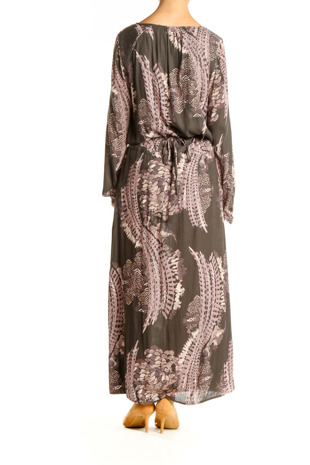 Back view of Free People brown floral maxi dress showing full-length silhouette and pattern