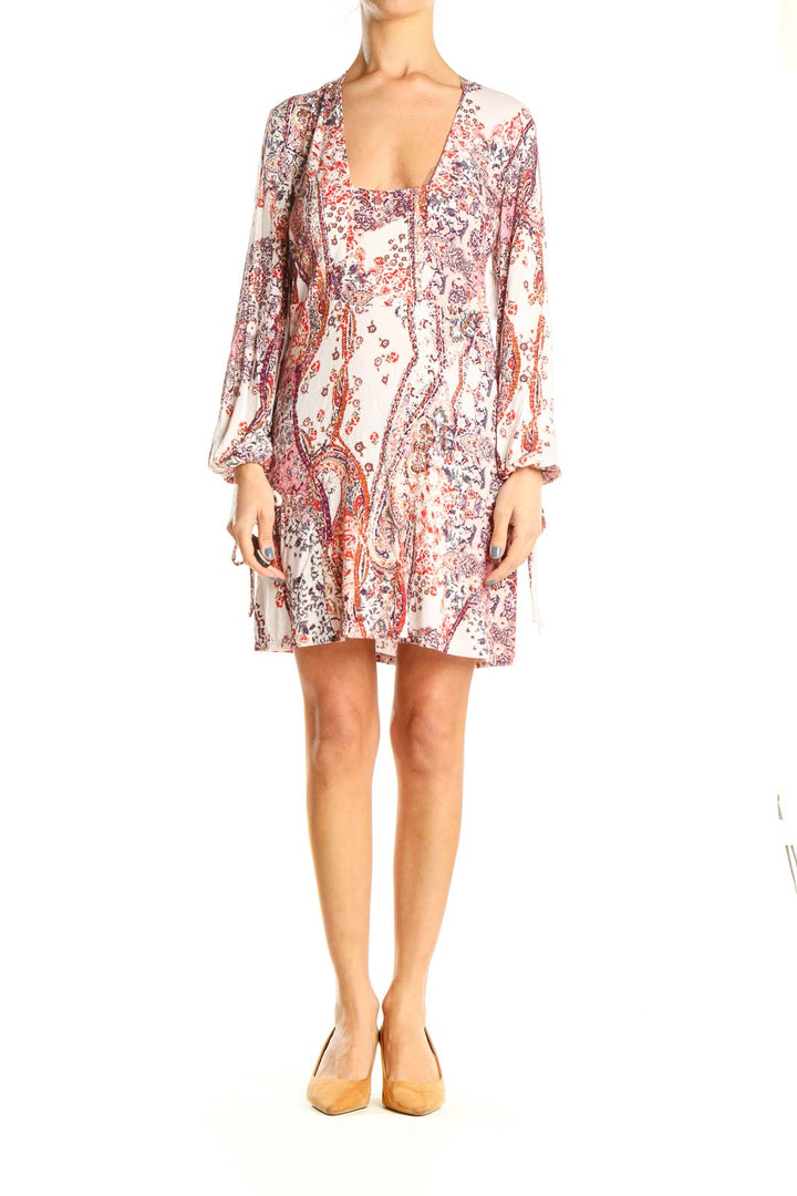 Front view of Free People white floral paisley mini dress with square neckline