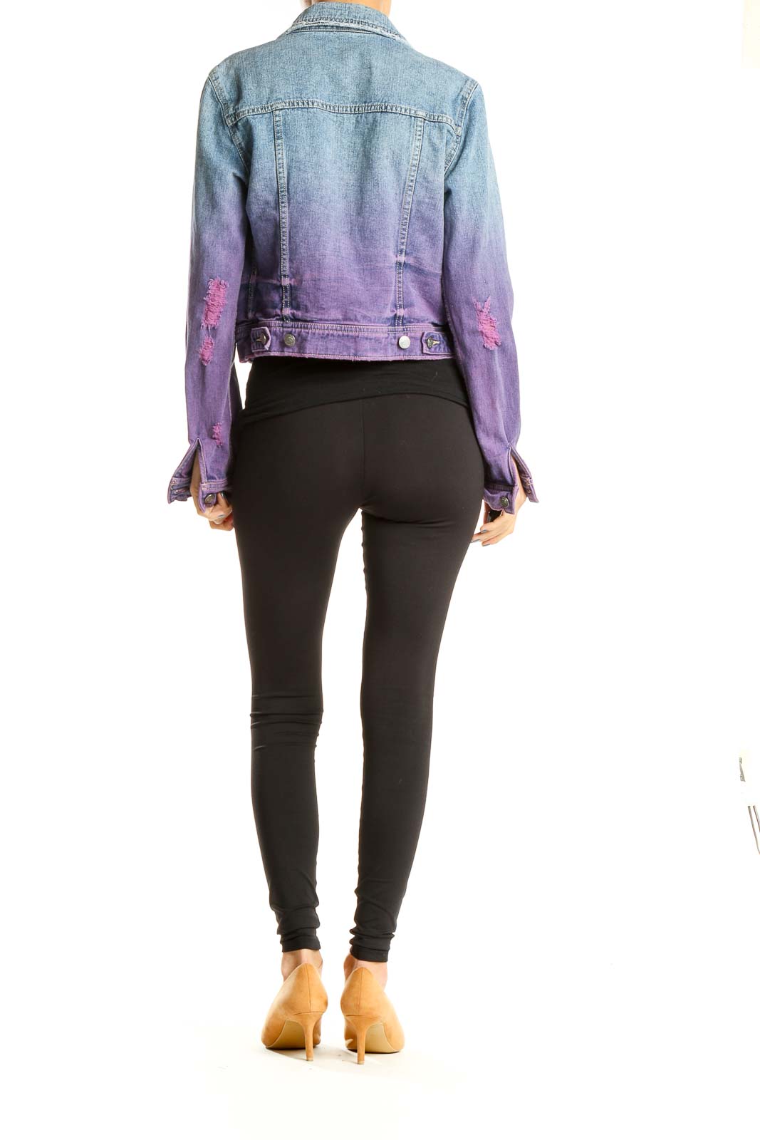 Back view of Free People ombre denim jacket showing blue to purple gradient and distressed hem