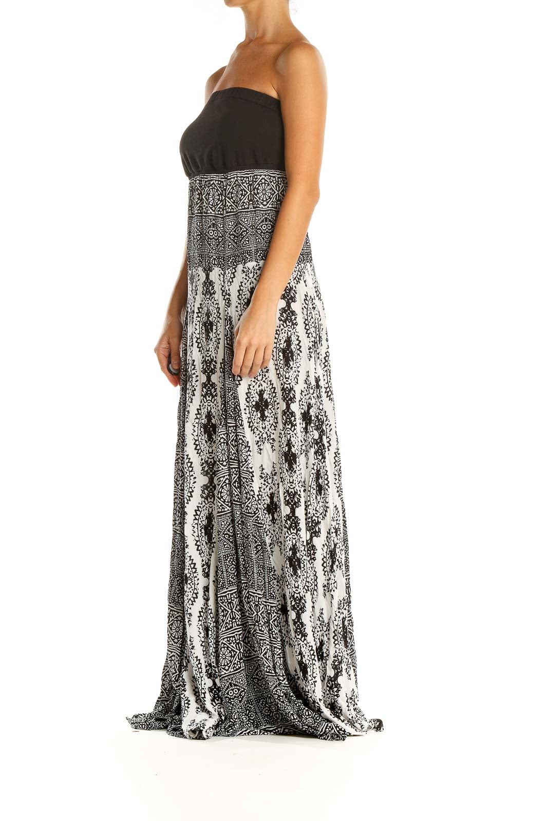 Front view of Free People black and white strapless maxi dress with geometric pattern