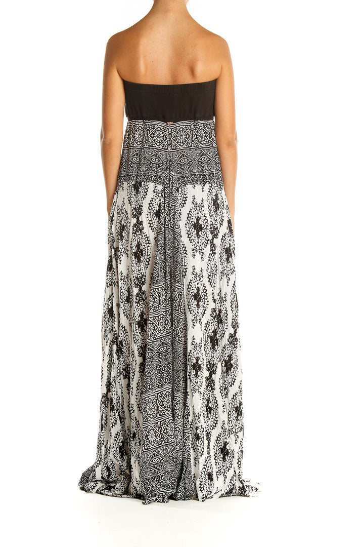 Back view of Free People black and white strapless maxi dress showing full-length design