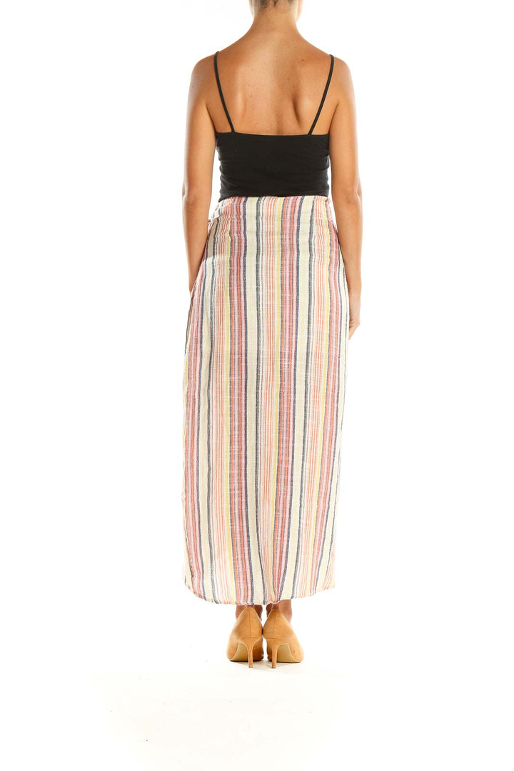 Back view of Free People multicolor striped wrap maxi skirt on model