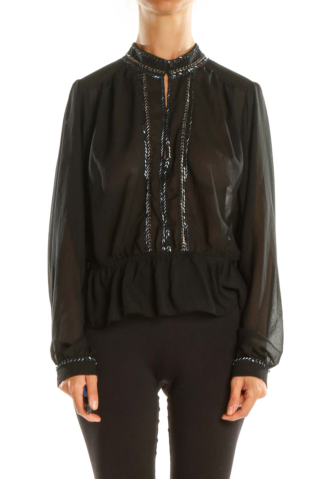 Front view of Free People black sheer embroidered peplum blouse