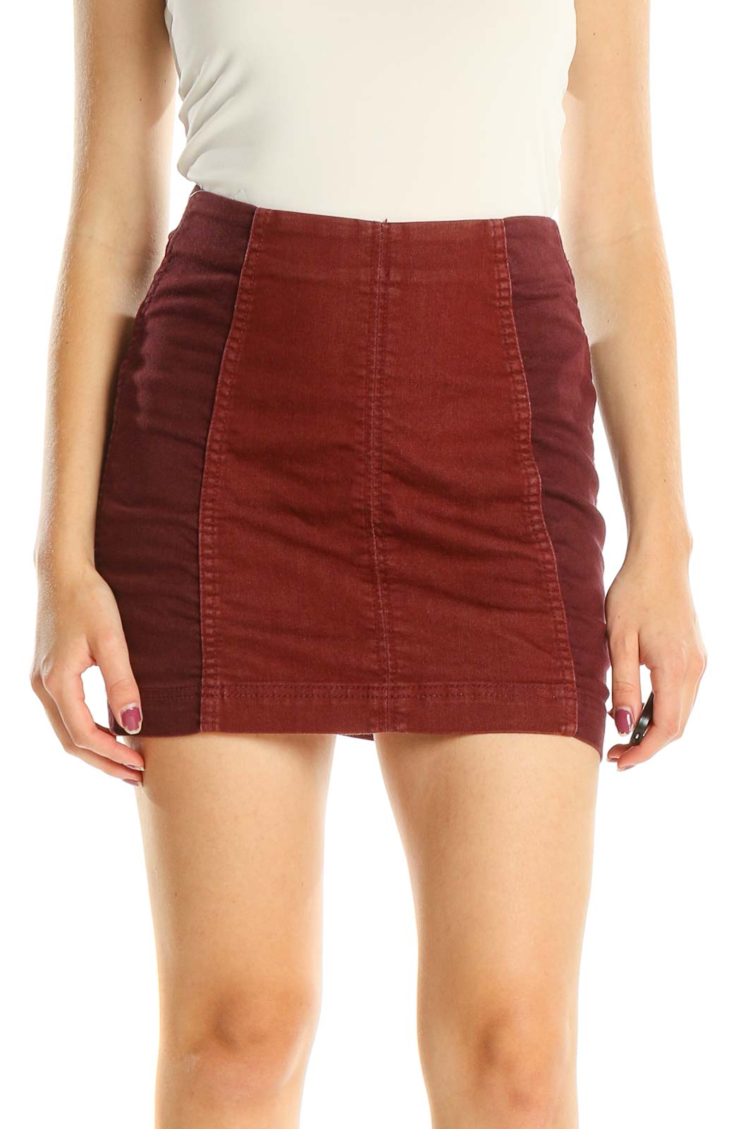 Front view of Free People burgundy corduroy mini skirt with two-tone design