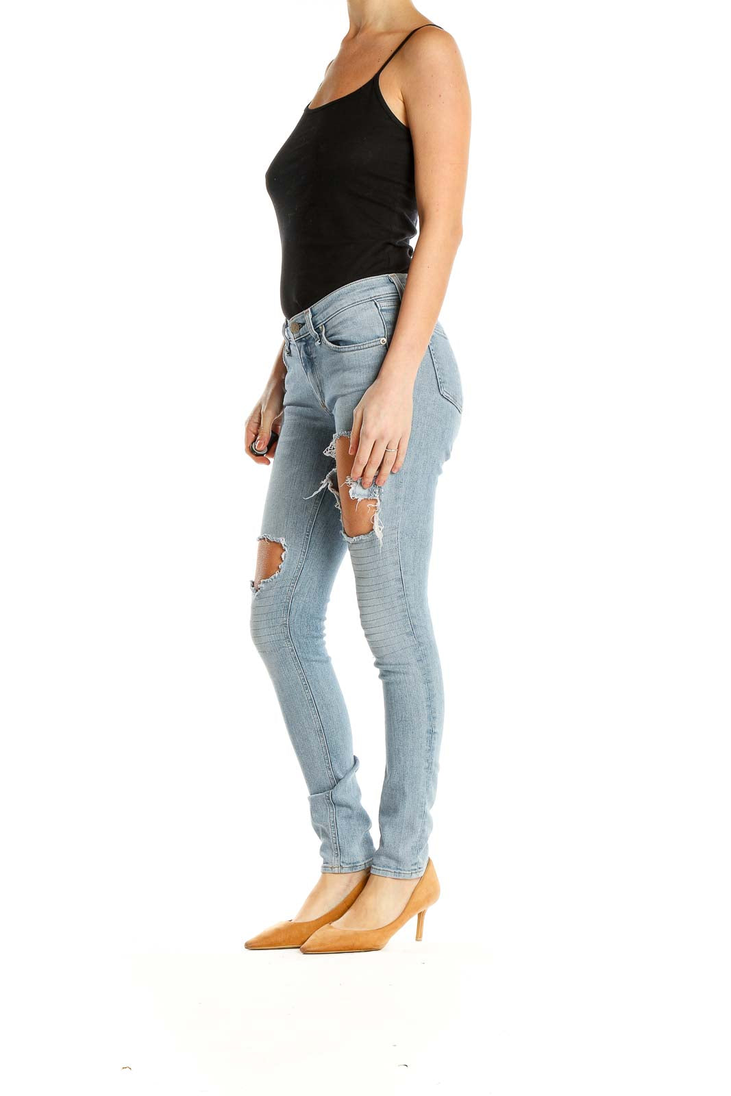 Front view of Rag & Bone light blue distressed skinny jeans with knee rips