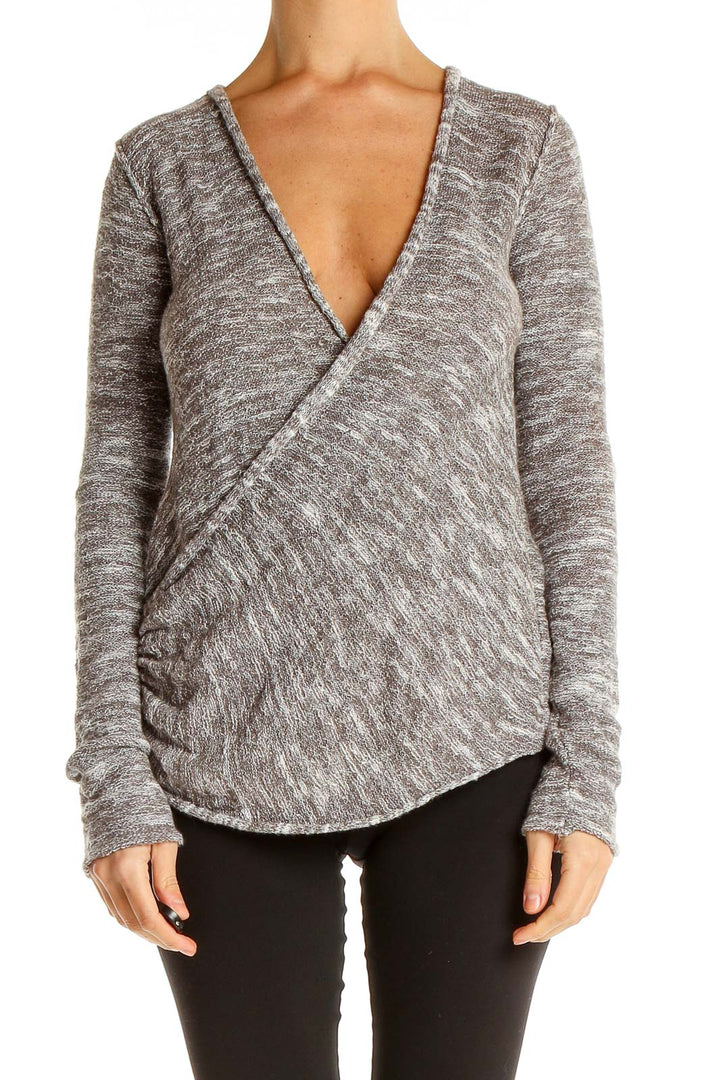 Front view of gray wrap-style knit sweater from Free People