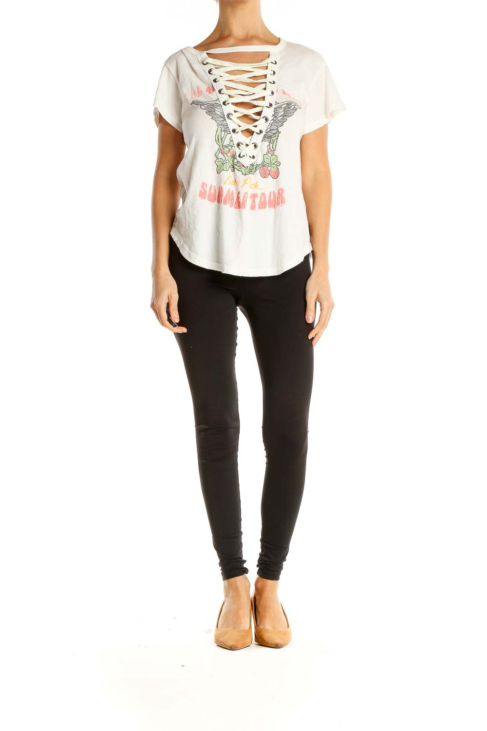 Front view of white Free People t-shirt with lace-up neckline and winged graphic design