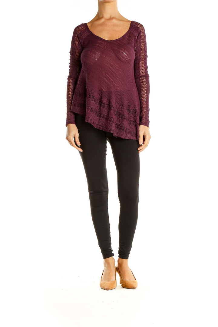 Front view of burgundy Free People top with lace sleeves and asymmetrical hem