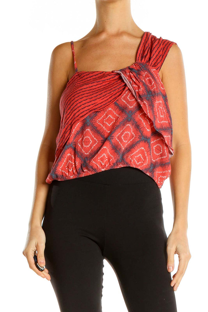 Front view of red geometric print asymmetrical tank top by Free People