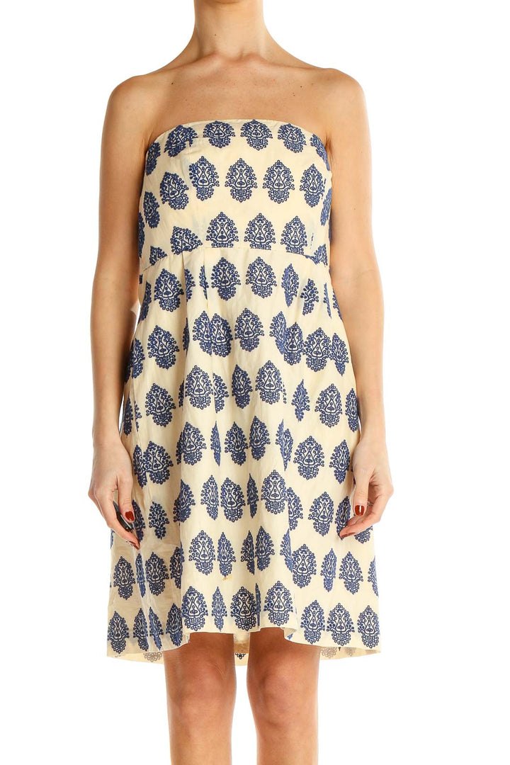 Front view of J.Crew cream strapless dress with navy paisley print