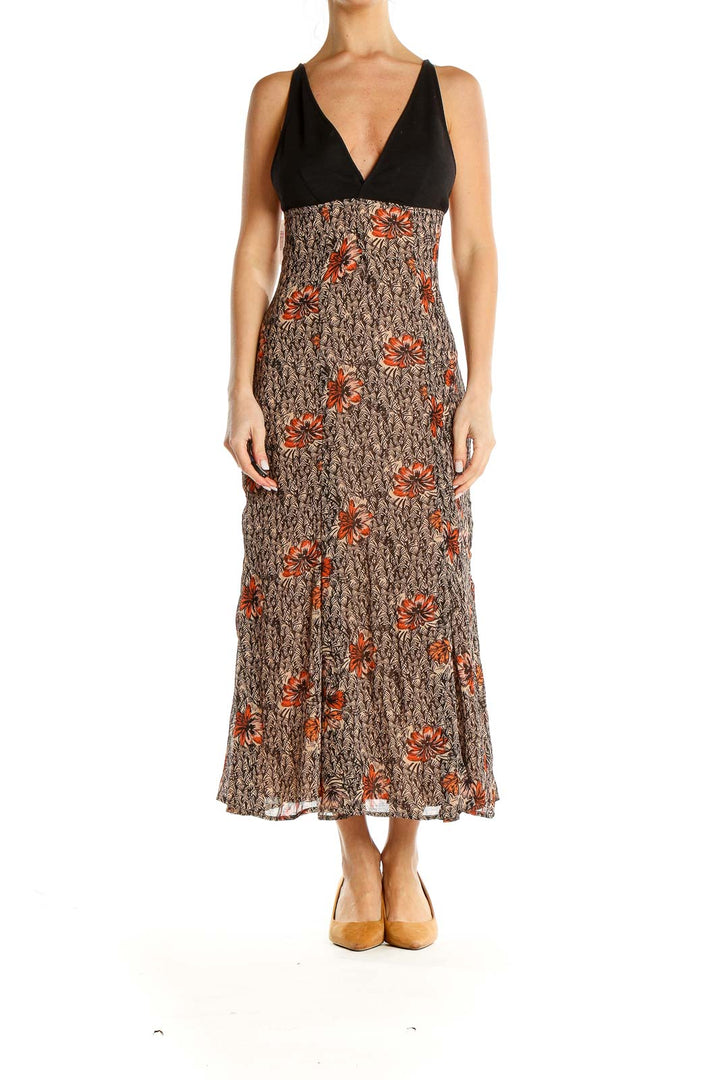 Front view of Free People brown floral maxi dress with black V-neck