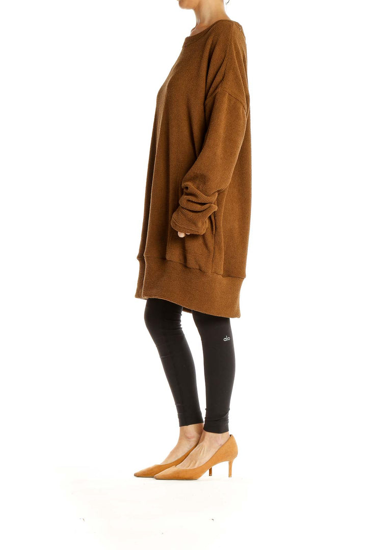 Front view of brown oversized knit sweater dress from Free People