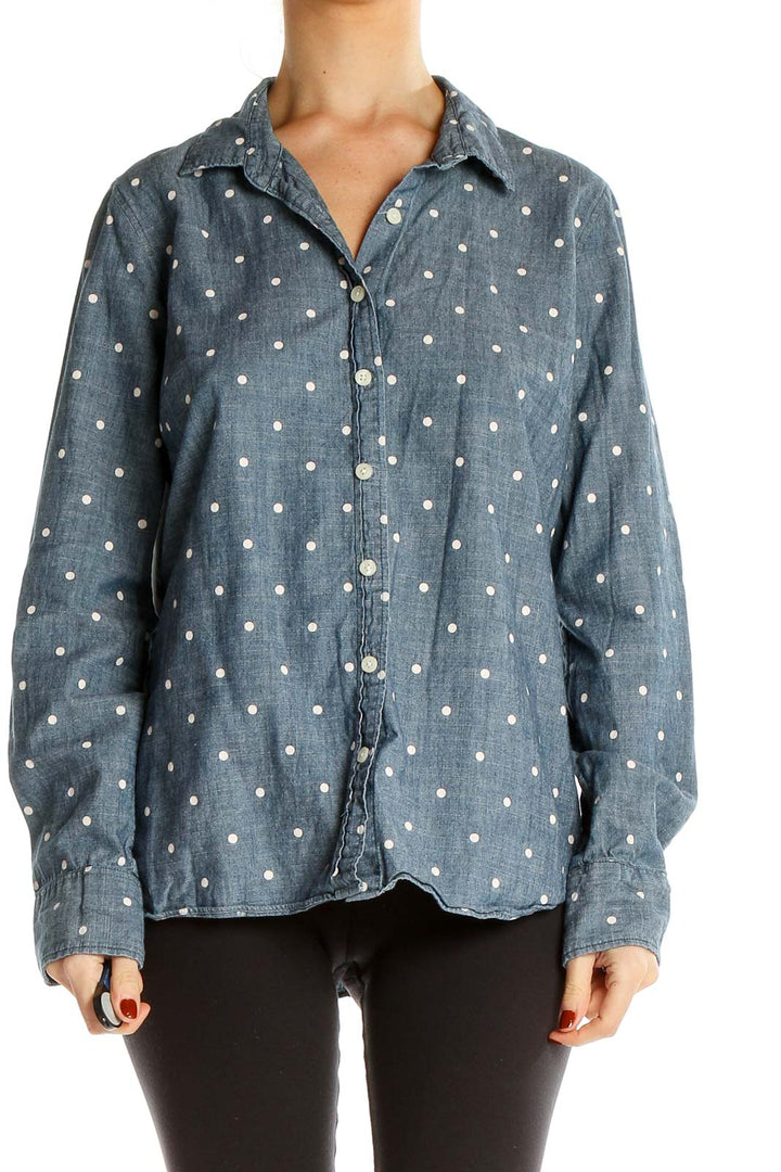 Front view of J.Crew blue chambray shirt with white polka dots